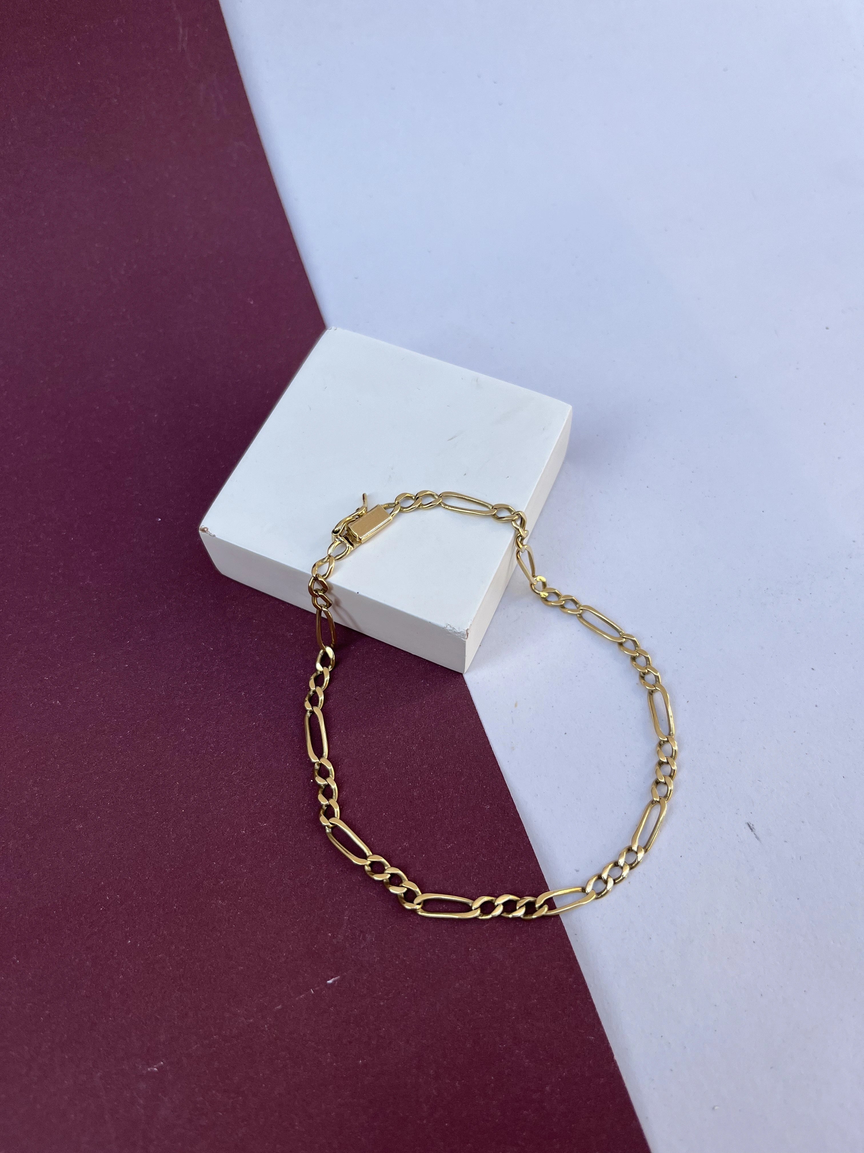 O Pulseira Elo 3X1 Maciço em (OURO 18KT)