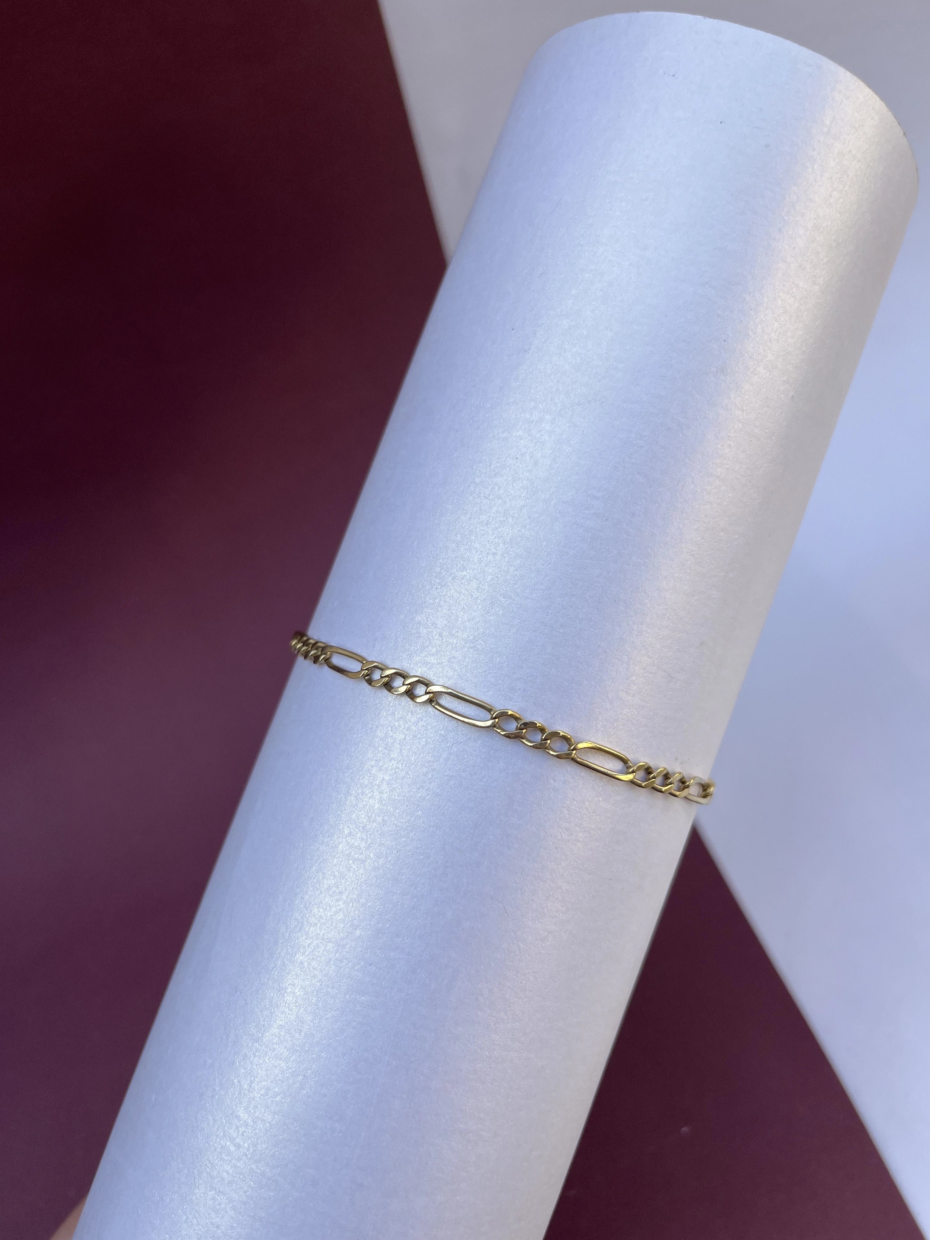 O Pulseira Elo 3X1 Maciço em (OURO 18KT)