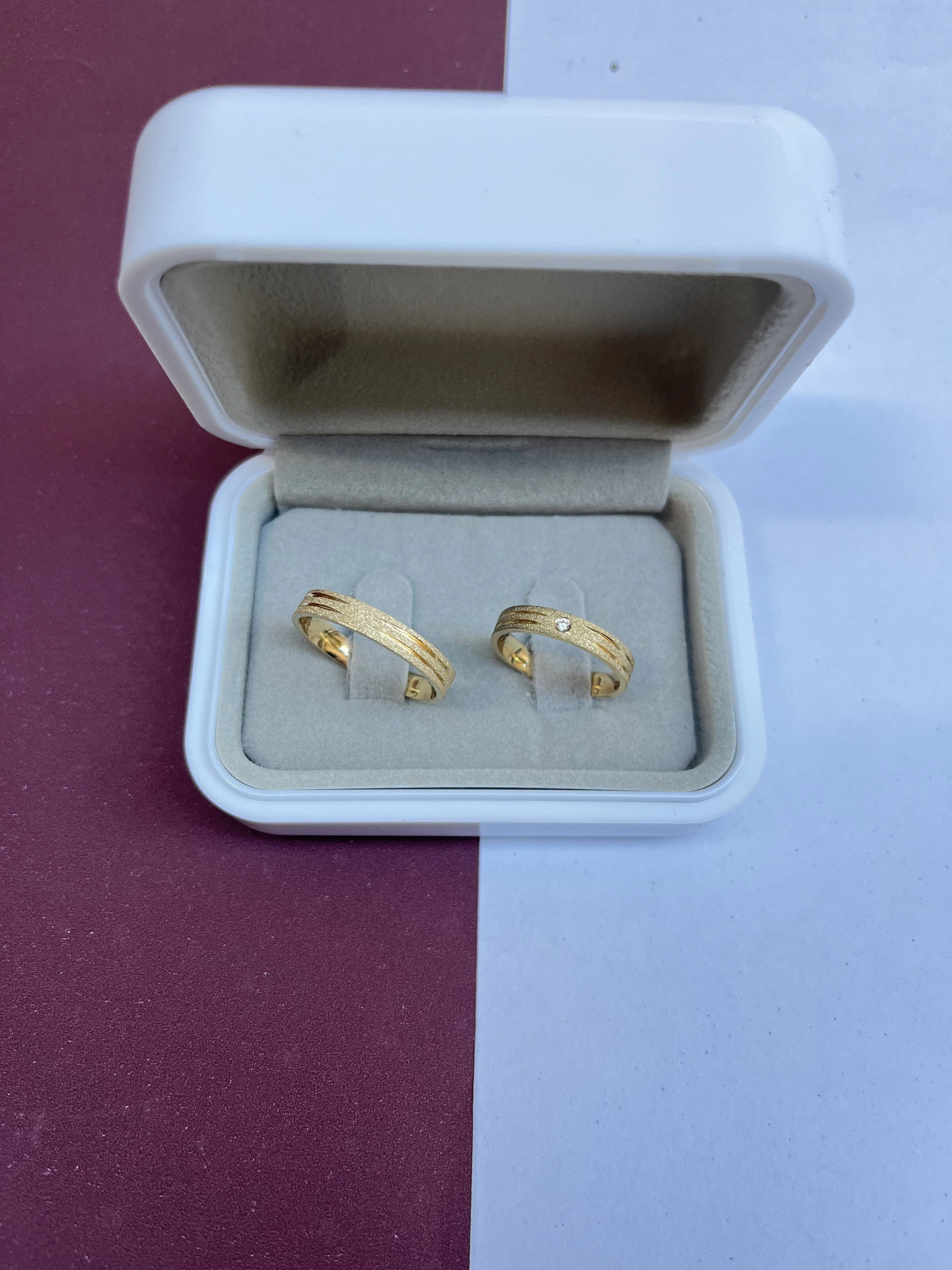 O Par de Aliança de Casamento em (OURO 18KT)