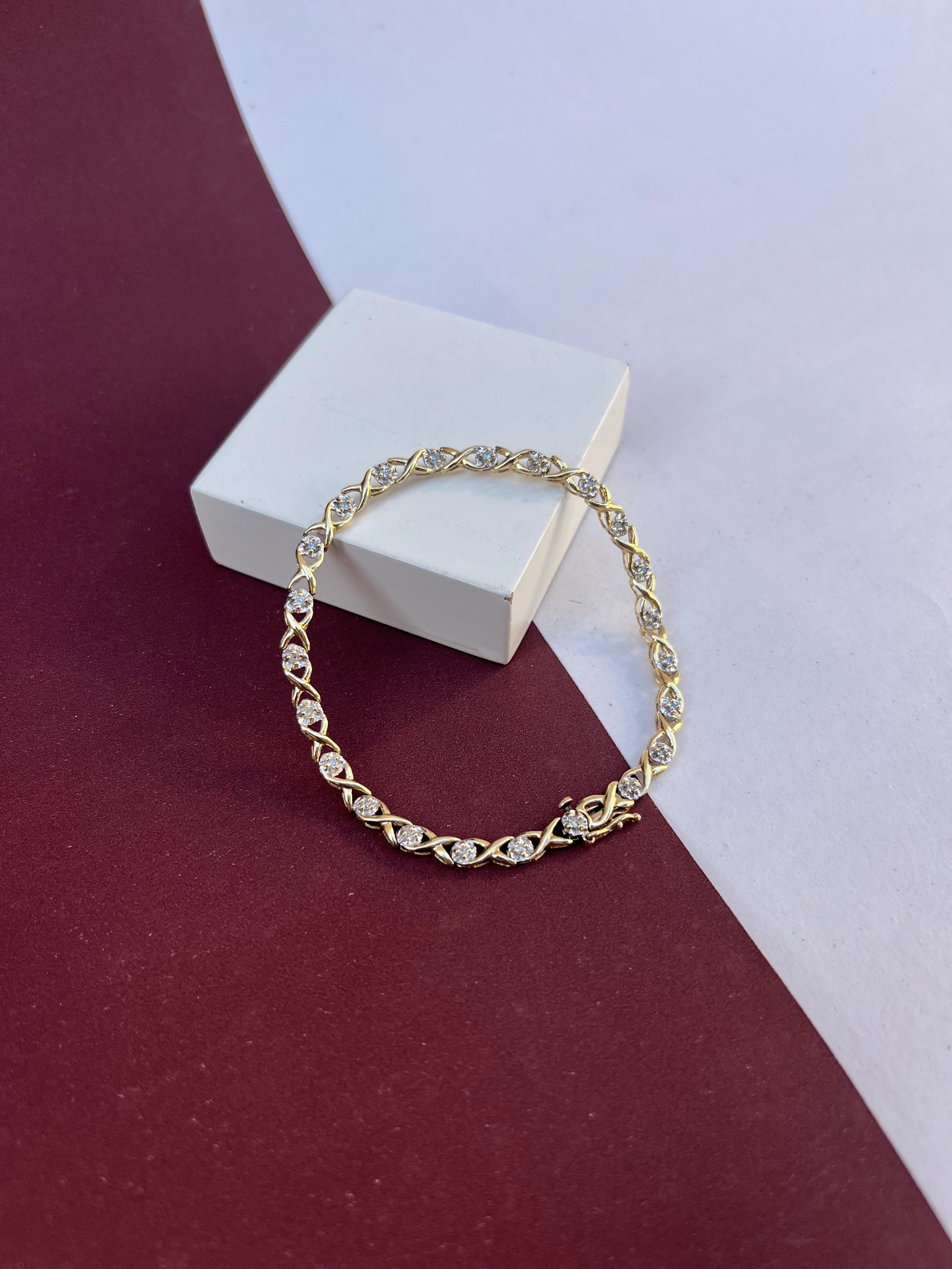 Pulseira X com Diamantes em (OURO 10KT)
